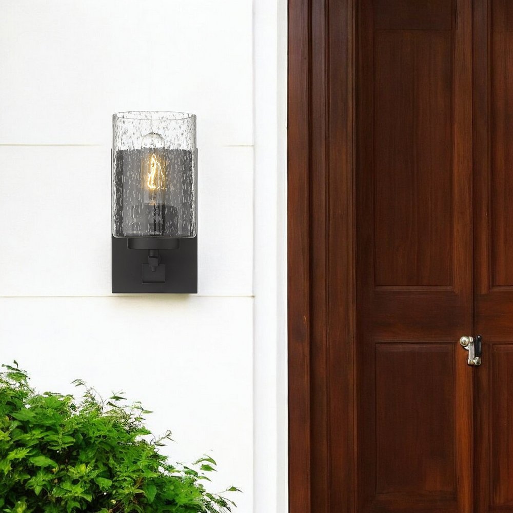 Bronze Metal and Textured Glass Wall Sconce HomeRoots