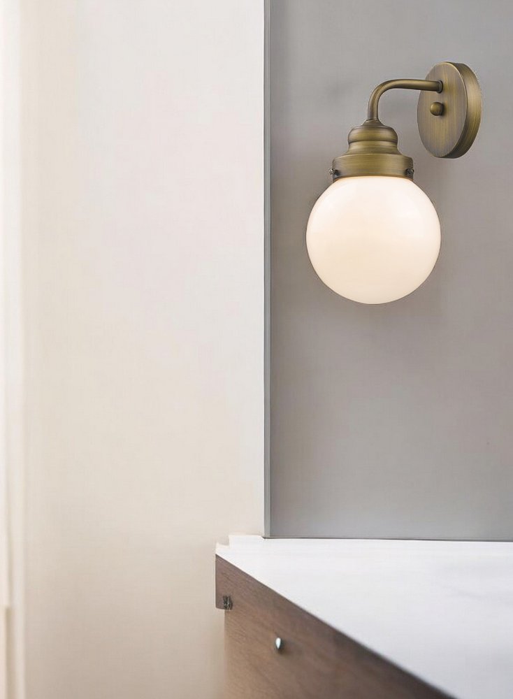 One Light Gold Wall Sconce with Round Glass Shade HomeRoots