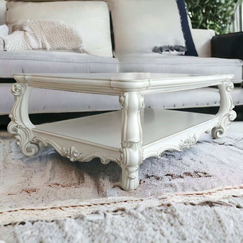 57" Antiqued White Wood Coffee Table With Shelf