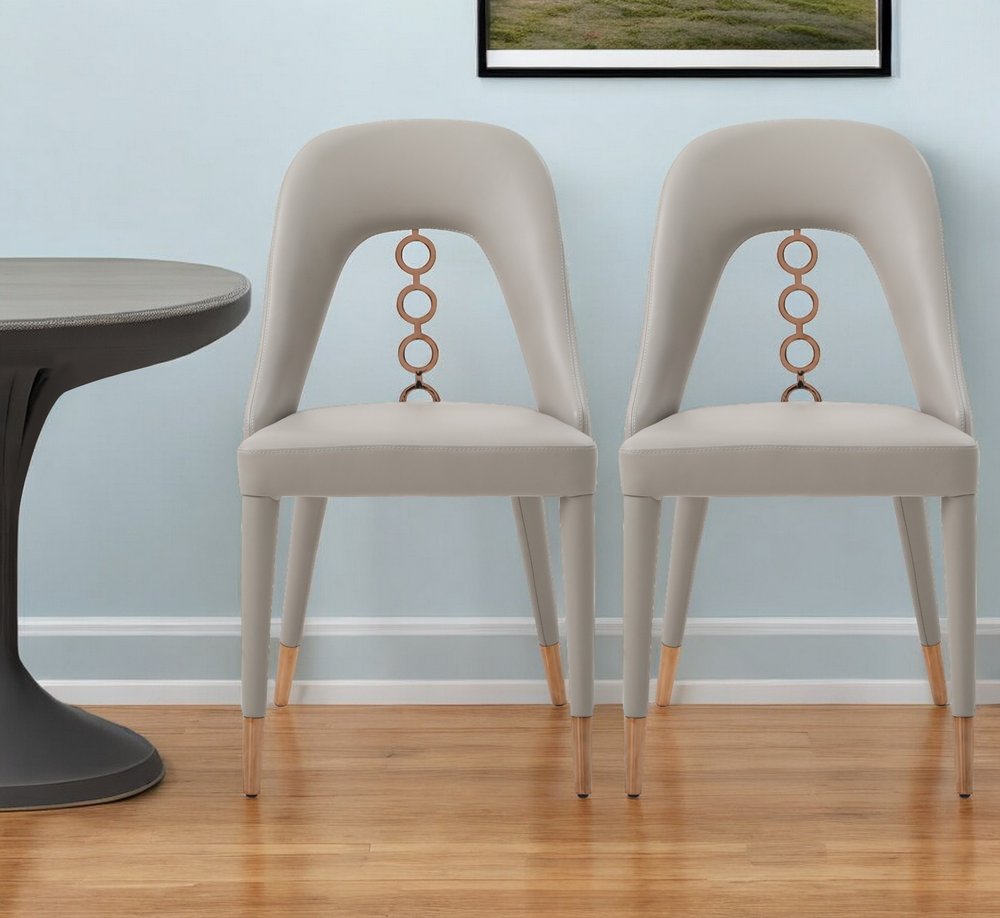 Set of Two Light Gray Faux Leather Dining Side Chairs With Rose Gold Accents HomeRoots