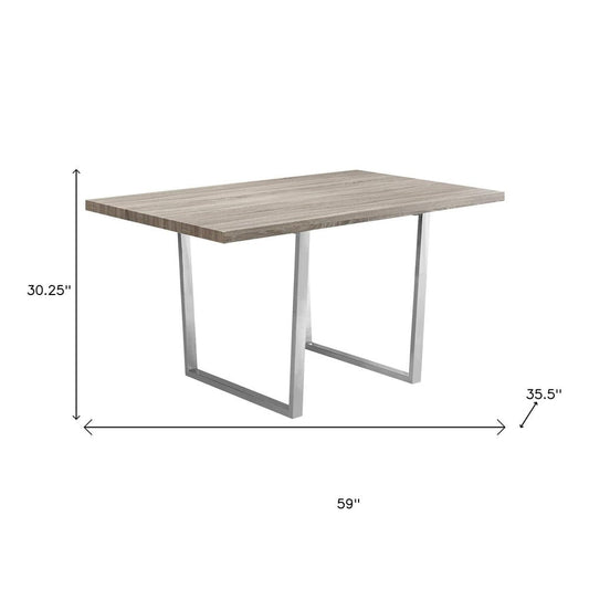 59" Taupe And Silver Solid Wood And Metal Sled Base Dining Table HomeRoots