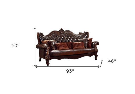 93" Brown Faux Leather Sofa And Toss Pillows With Burgundy Legs HomeRoots