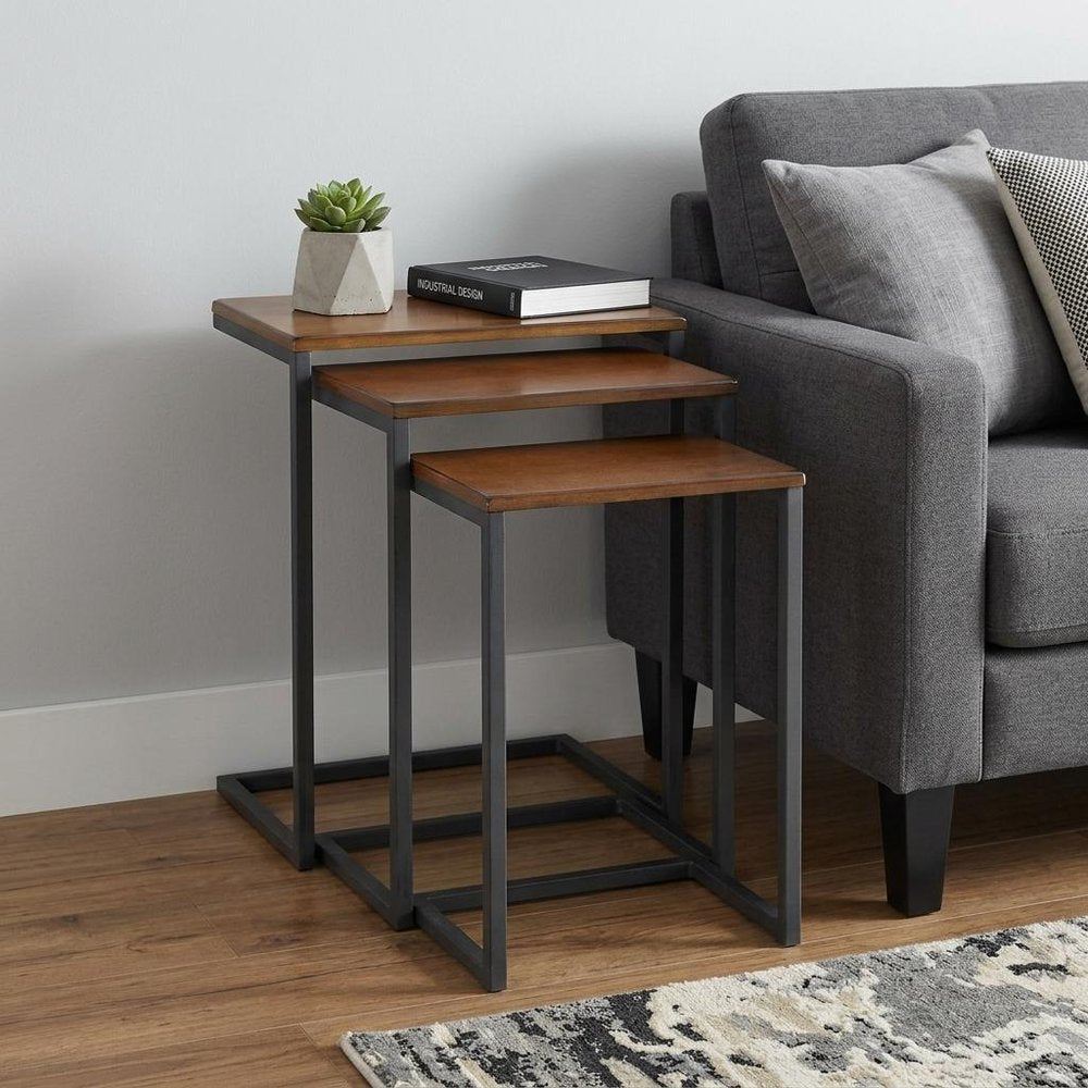 Set of Three Brown and Black Distressed Solid Wood and Metal Frame Nested Tables HomeRoots