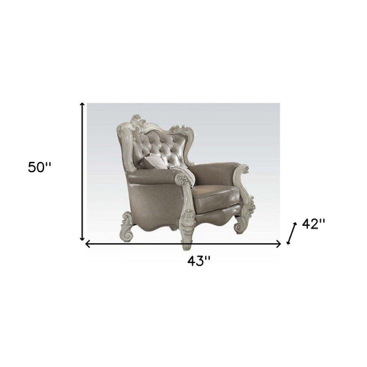 43" Gray and Bone Faux Leather Tufted Chesterfield Chair And Toss Pillows HomeRoots