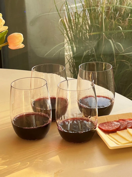 Set of Four Clear Dimpled Tritan Plastic Stemless All Purpose Tumbler Wine Glasses HomeRoots