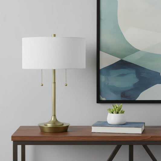 20" Antiqued Brass Metal Two Light Table Lamp With White Drum Shade HomeRoots