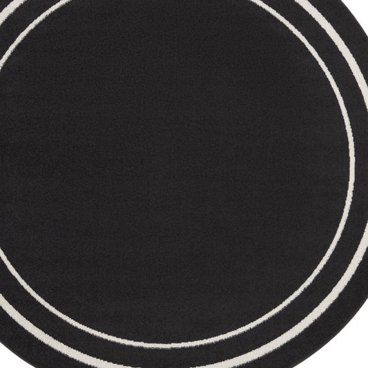 8' Black And Ivory Round Indoor Outdoor Area Rug