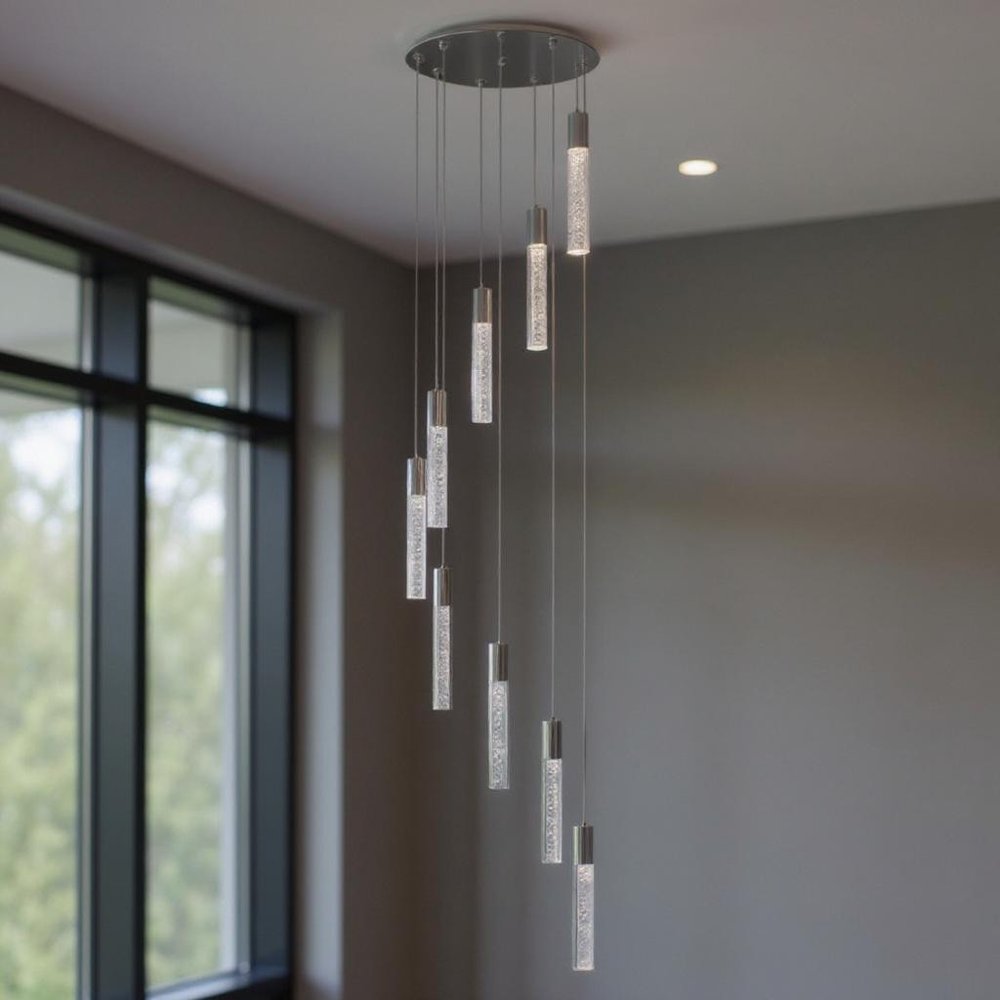 Silver And Clear Nine Light Metal Dimmable Chandelier With Clear Shades HomeRoots