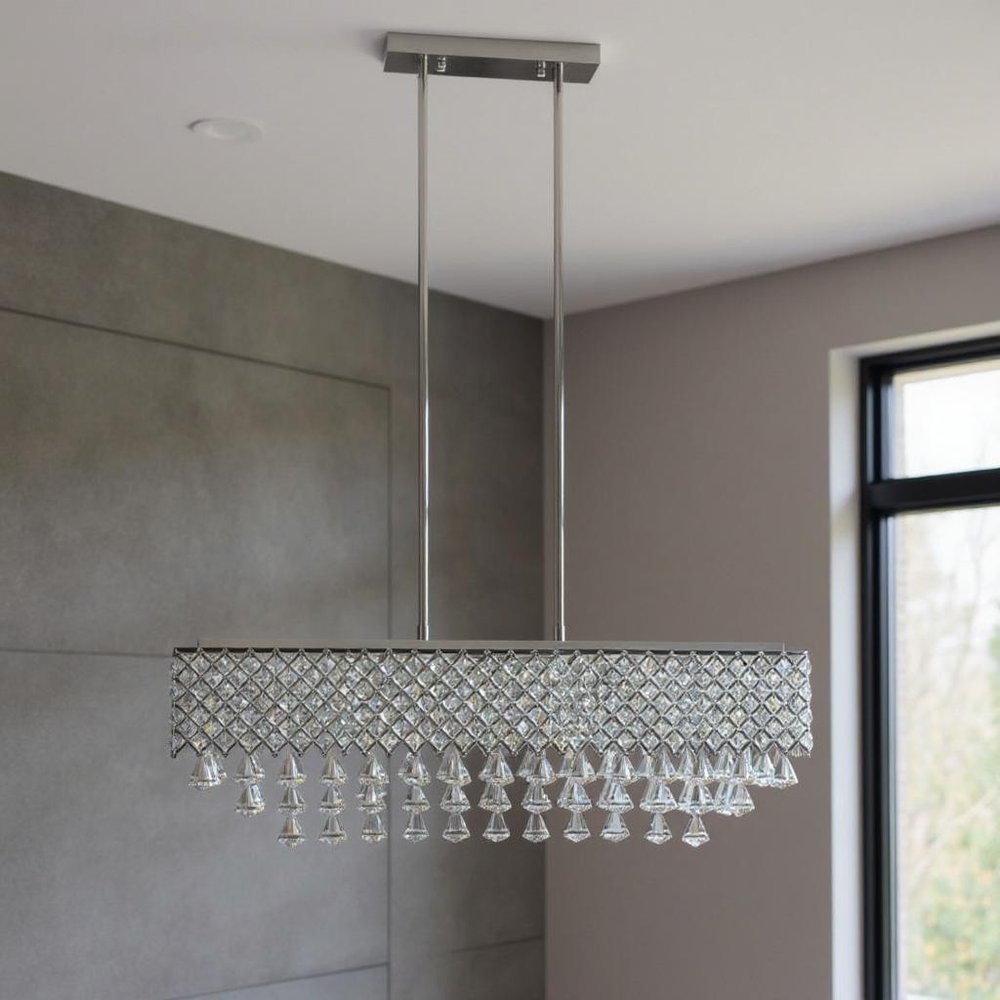 Silver And Clear Twelve Light Metal Dimmable Chandelier With Clear Shades HomeRoots