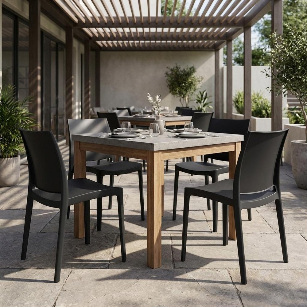 Set of Four Dark Gray Heavy Duty Plastic Outdoor Stacking Dining Chairs HomeRoots