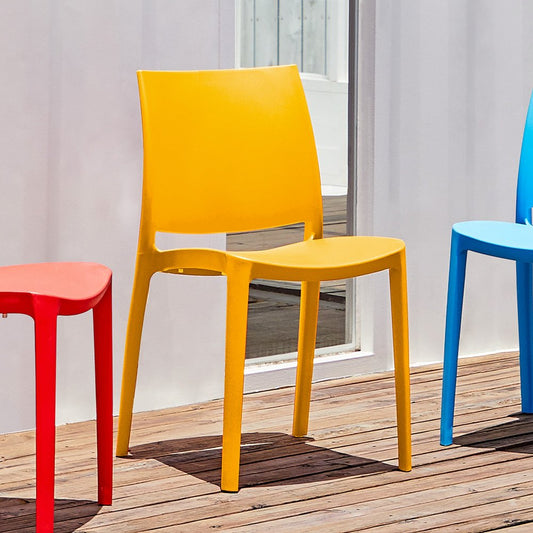 Set of Four Gold Heavy Duty Plastic Outdoor Stacking Dining Chairs HomeRoots