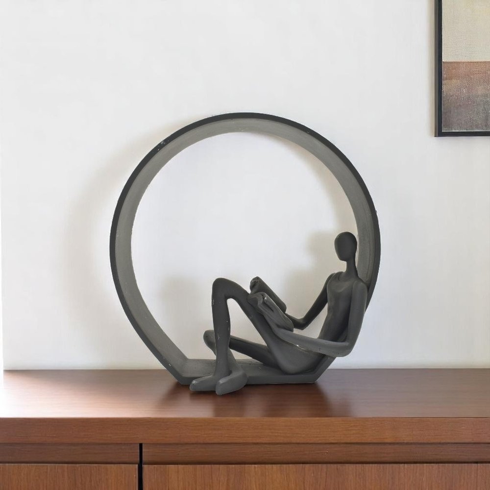 7" Black Resin Man Tabletop Sculpture HomeRoots