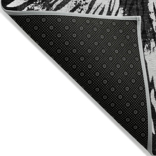 5' X 8' Black Charcoal And Ivory Abstract Washable Indoor Outdoor Area Rug