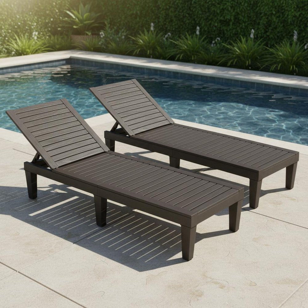 Set of Two Black Heavy Duty Resin Outdoor Chaise Lounges HomeRoots