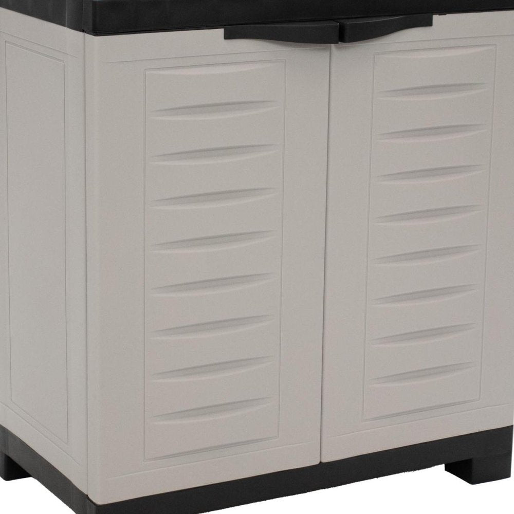 23" Black and Gray Plastic Accent Cabinet With Two Doors HomeRoots