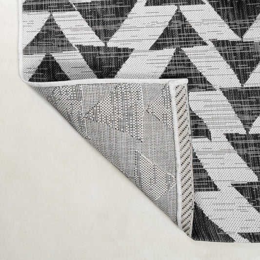 8' Ivory And Black Geometric Indoor Outdoor Runner Rug