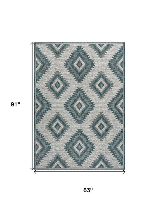 5' X 8' Turquoise And Cream Moroccan Indoor Outdoor Area Rug