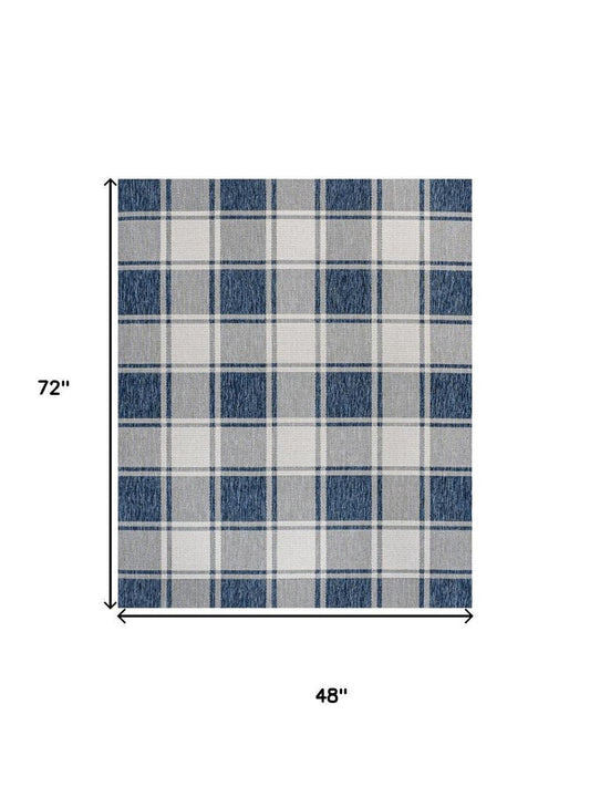 4' X 6' Navy Blue And Cream Gingham Indoor Outdoor Area Rug