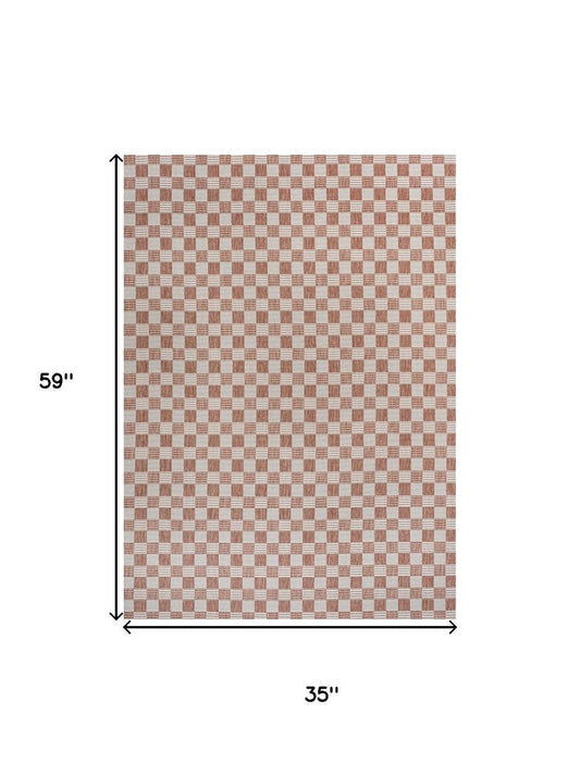 3' X 5' Salmon And Cream Geometric Indoor Outdoor Area Rug