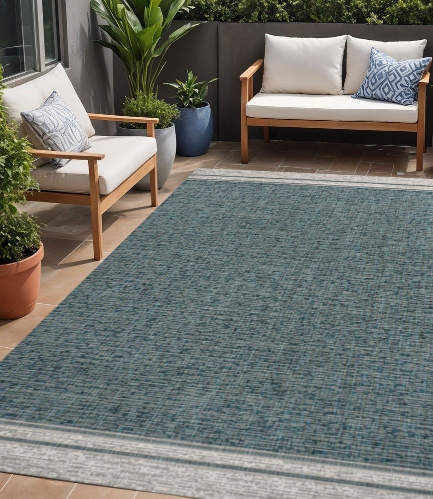 5' X 8' Turquoise And Cream Indoor Outdoor Area Rug