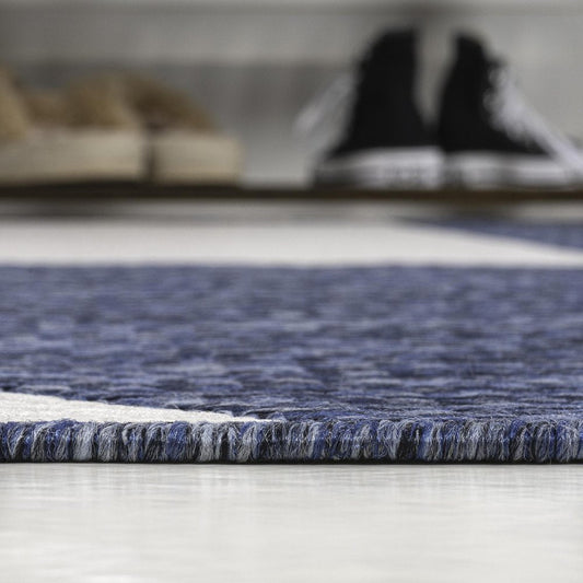 5' X 8' Navy Blue And Cream Geometric Indoor Outdoor Area Rug