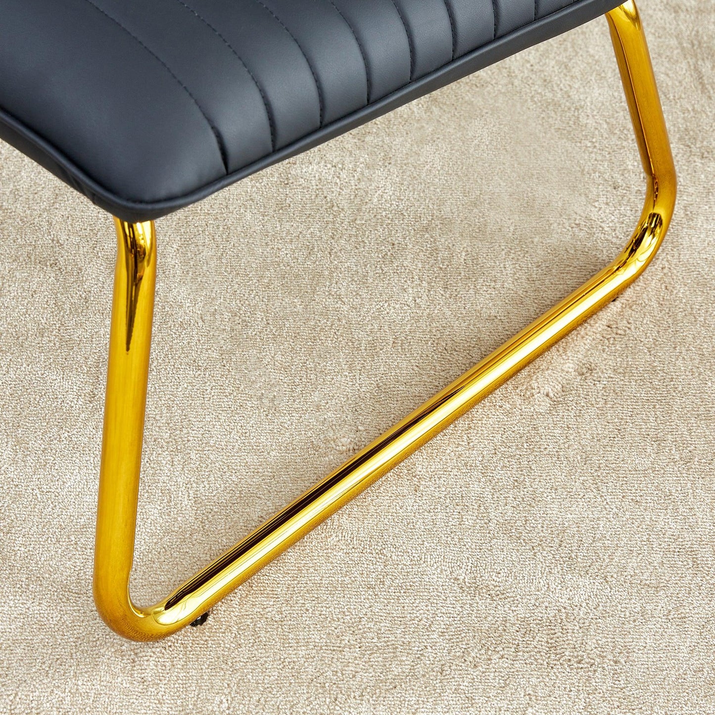 Black minimalist armless sofa chair with PU backrest and golden metal legs suitable for offices restaurants - FurniFindUSA