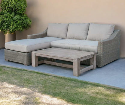 Three Piece Outdoor Gray Rattan Sectional Seating Group with Beige Cushions