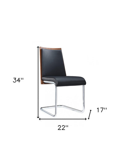 Set of Two Black and Silver Upholstered Faux Leather Dining Parsons Chairs HomeRoots
