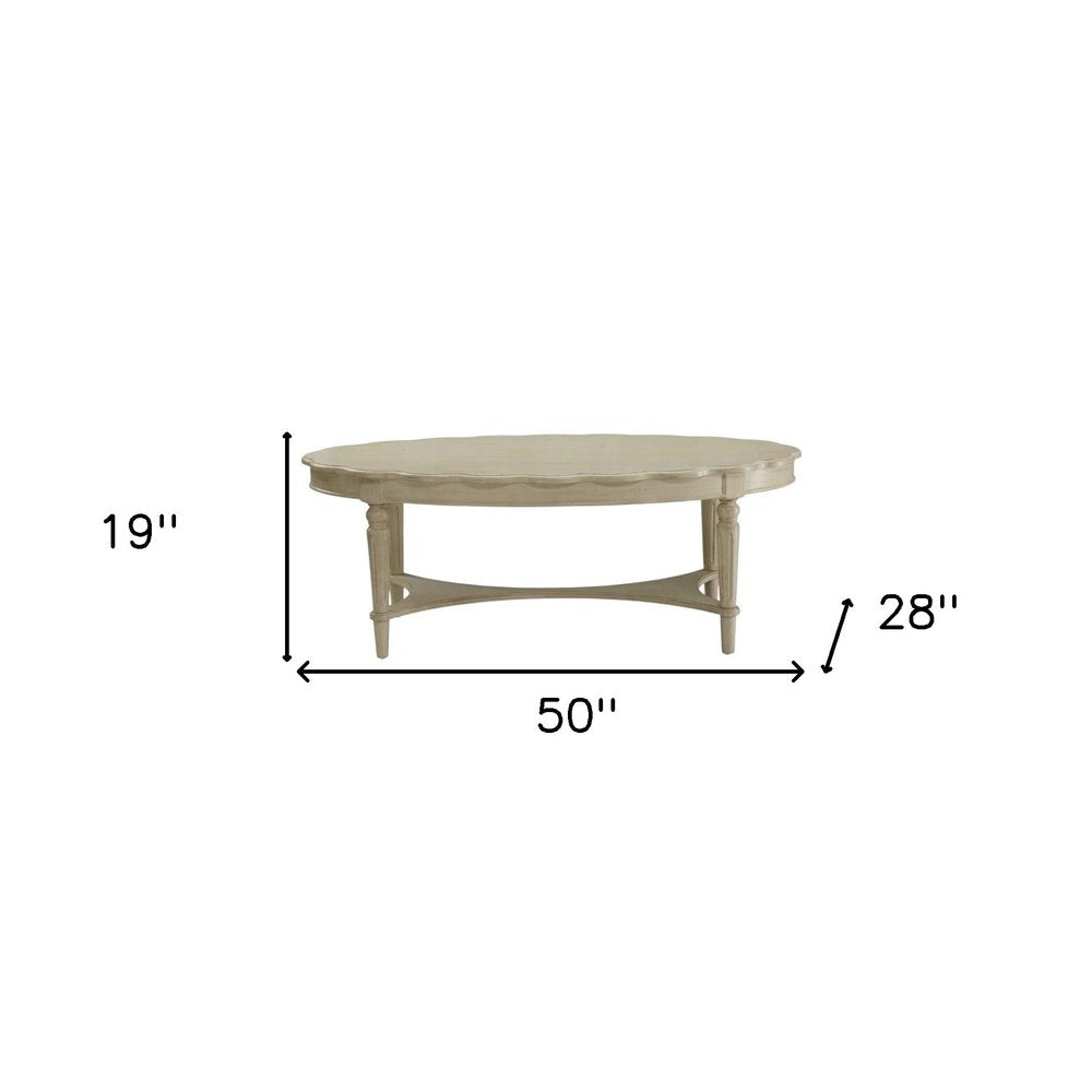 50" Antiqued White Solid Wood Oval Distressed Coffee Table — view 8