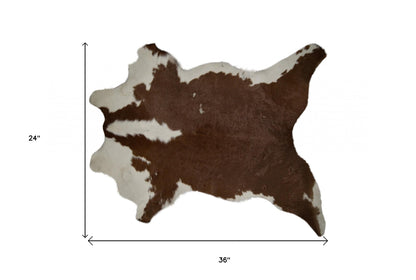 2' X 3' Brown and White Cowhide Hand Woven Area Rug