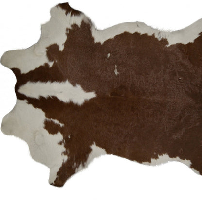 2' X 3' Brown And White Cowhide Cowhide Print Hand Tufted Area Rug - Image 4
