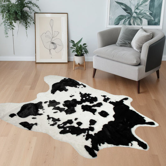 4' X 5' Black and White Faux Cowhide Animal Print Area Rug - 94.49" (L) x 133.86" (W) x 0.31" (H)