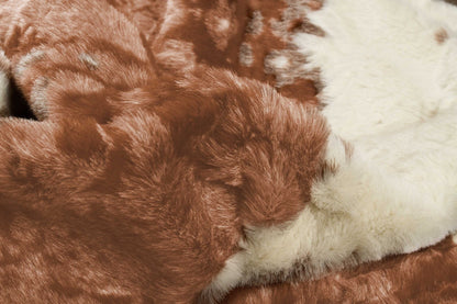 4' x 5' Brown and Ivory Faux Cowhide Animal Print Printed Area Rug