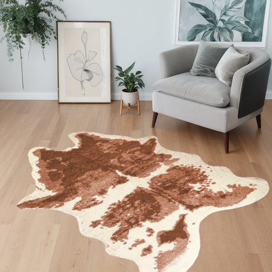 4' X 5' Brown and Ivory Faux Cowhide Animal Print Printed Area Rug - 94.49" (L) x 133.86" (W) x 0.23" (H)