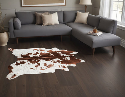 Brown And White Spotted Natural Cowhide Area Rug - 60.0" (H) x 84.0" (W) x 0.25" (D)