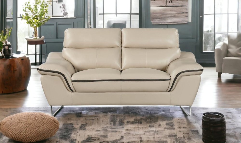 69" Beige And Silver Faux Leather Love Seat HomeRoots