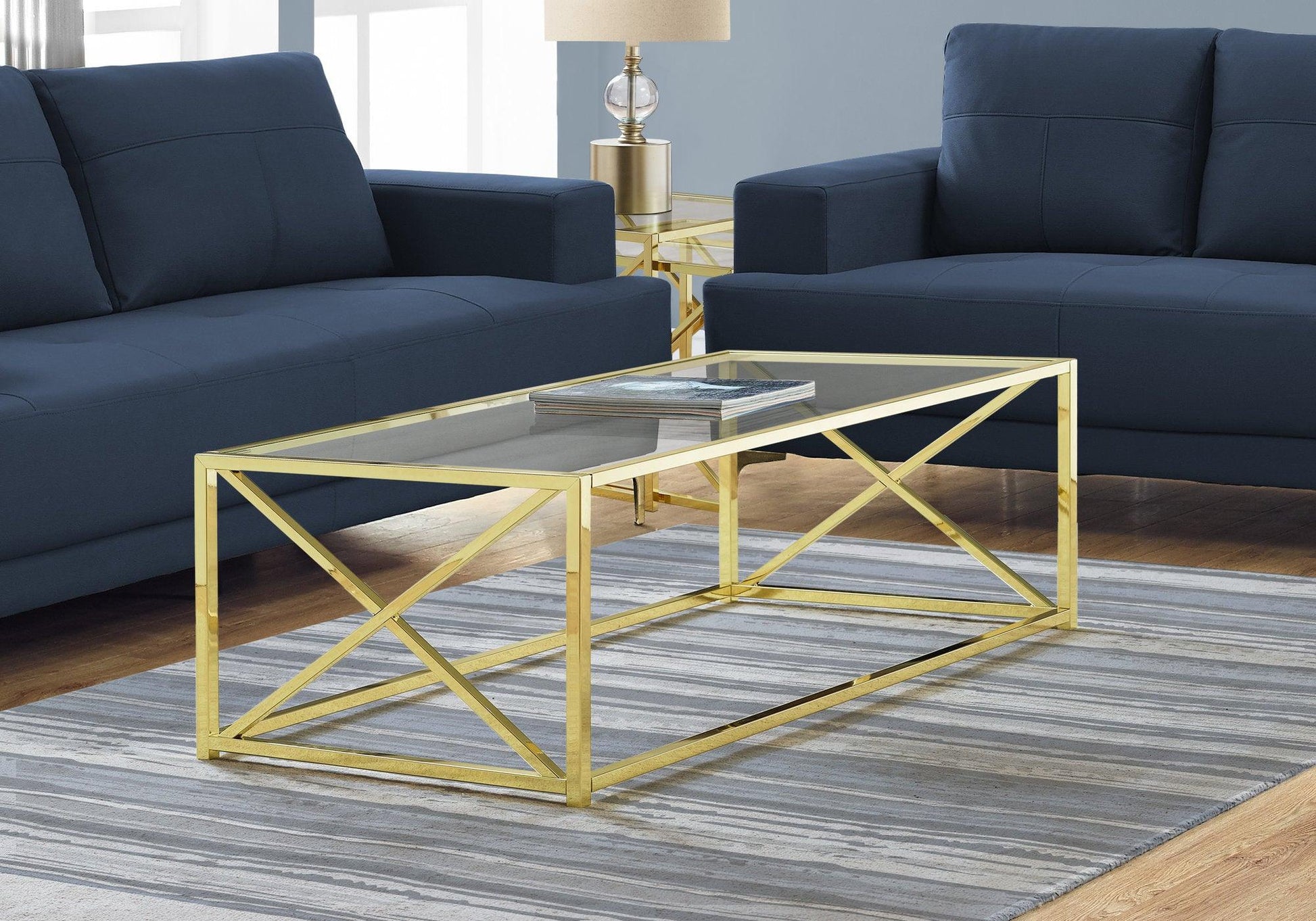 44" Clear And Gold Glass And Iron Coffee Table - FurniFindUSA