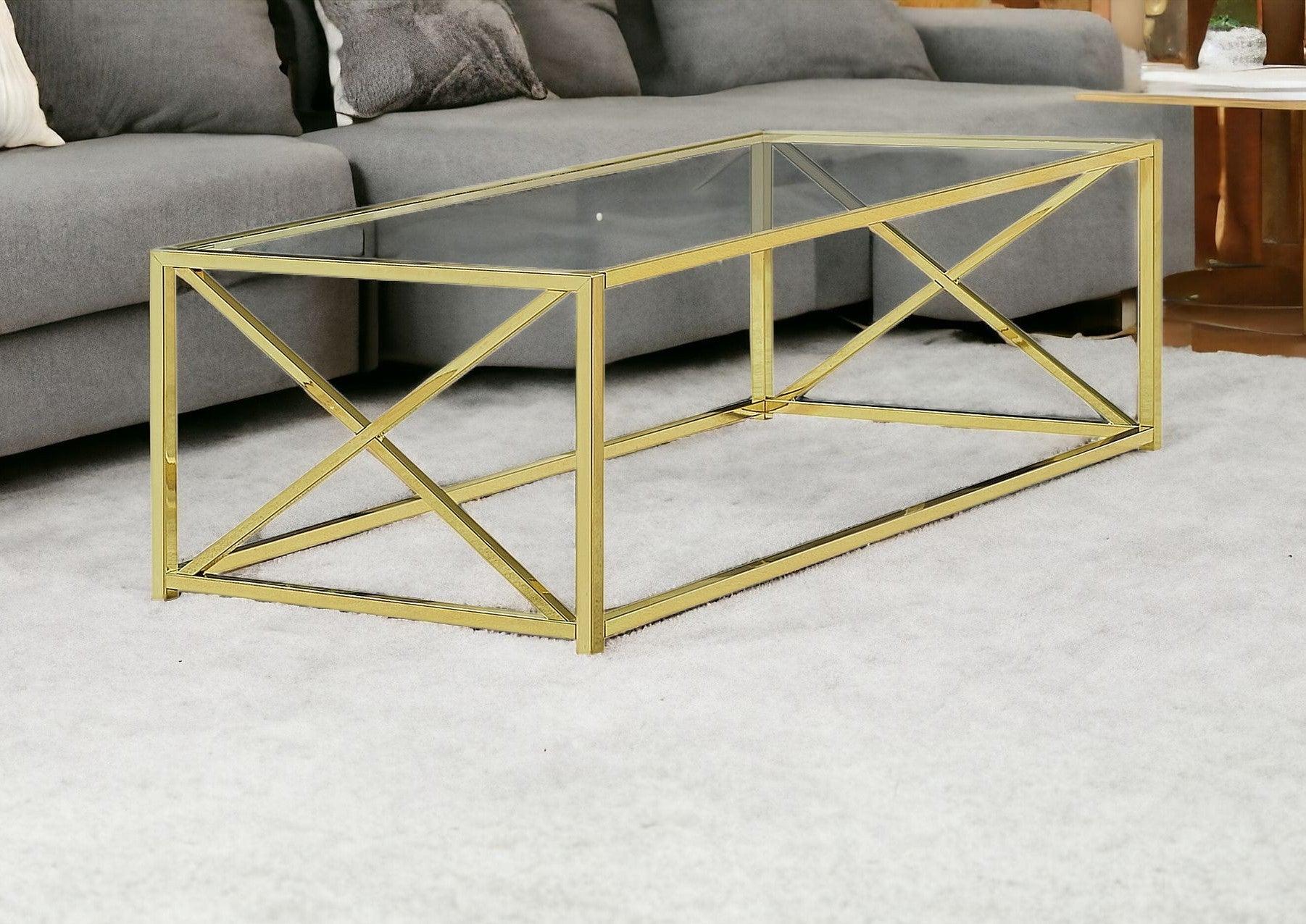 44" Clear And Gold Glass And Iron Coffee Table - FurniFindUSA
