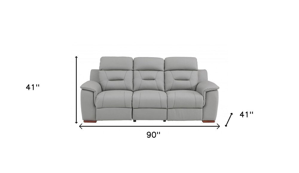 90" Gray Faux Leather Reclining Sofa With Brown Legs HomeRoots