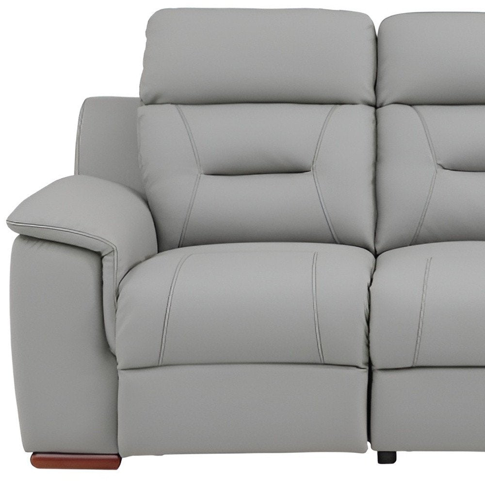 90" Gray Faux Leather Reclining Sofa With Brown Legs HomeRoots