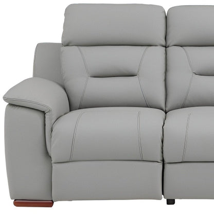 90" Gray Faux Leather Reclining Sofa With Brown Legs HomeRoots