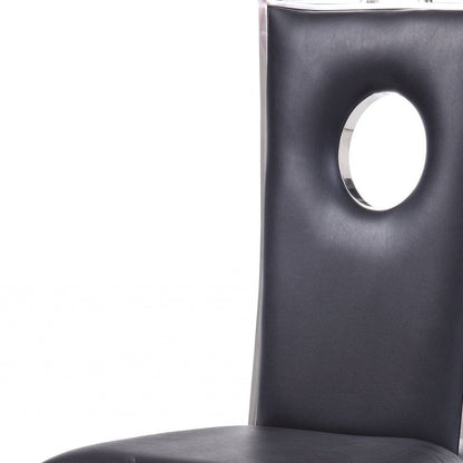 Set of Two Black And Silver Upholstered Faux Leather Dining Side Chairs HomeRoots