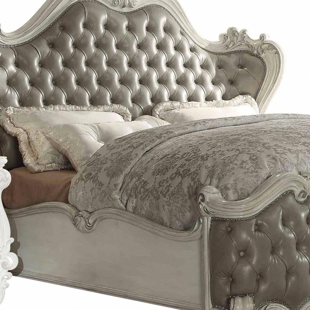 Gray and Bone Carved Scrollwork Solid Wood And Tufted Faux Leather Queen Bed Frame With Nailhead Trim HomeRoots