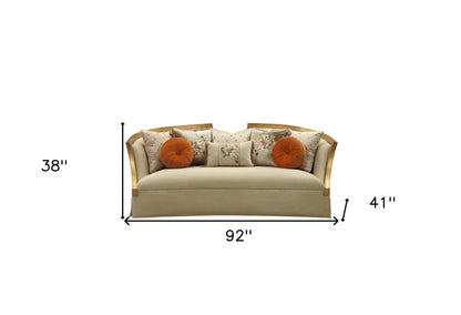 41" Beige Velvet Curved Sofa And Toss Pillows With Natural Legs