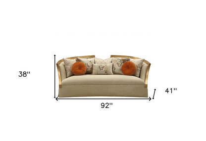 41" Beige Velvet Curved Sofa And Toss Pillows With Natural Legs HomeRoots