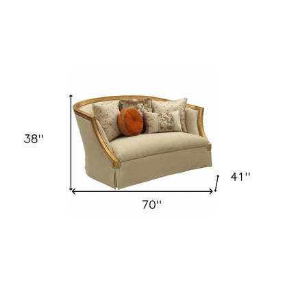70" Tan And Gold Curved Loveseat and Toss Pillows HomeRoots