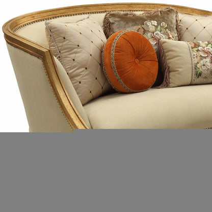 70" Tan And Gold Curved Loveseat and Toss Pillows HomeRoots