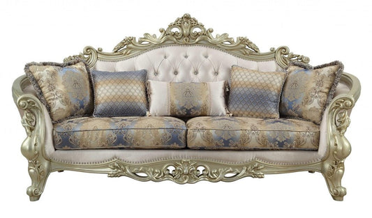 40" Antiqued White Velvet Curved Floral Sofa And Toss Pillows With Champagne Legs HomeRoots