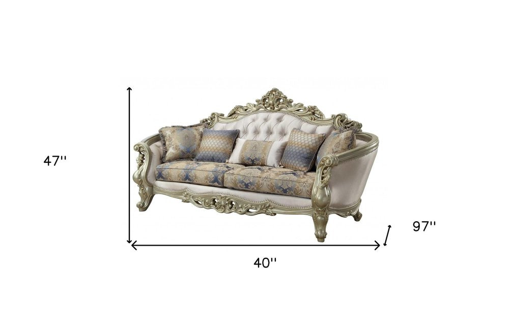 40" Antiqued White Velvet Curved Floral Sofa And Toss Pillows With Champagne Legs HomeRoots