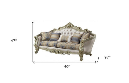40" Antiqued White Velvet Curved Floral Sofa And Toss Pillows With Champagne Legs HomeRoots